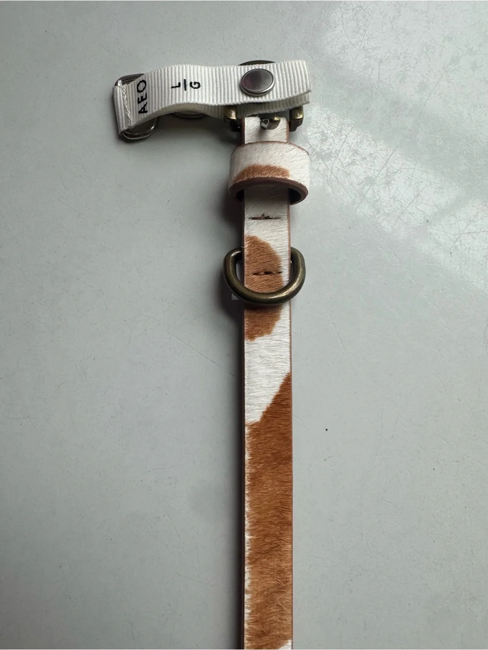 American Eagle cow print hair on hide skinny belt size large